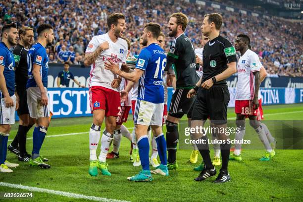 Dennis Diekmeier of Hamburg reacts after fouled by Sead Kolasinac of Schalke during the Bundesliga match between FC Schalke 04 and Hamburger SV at...