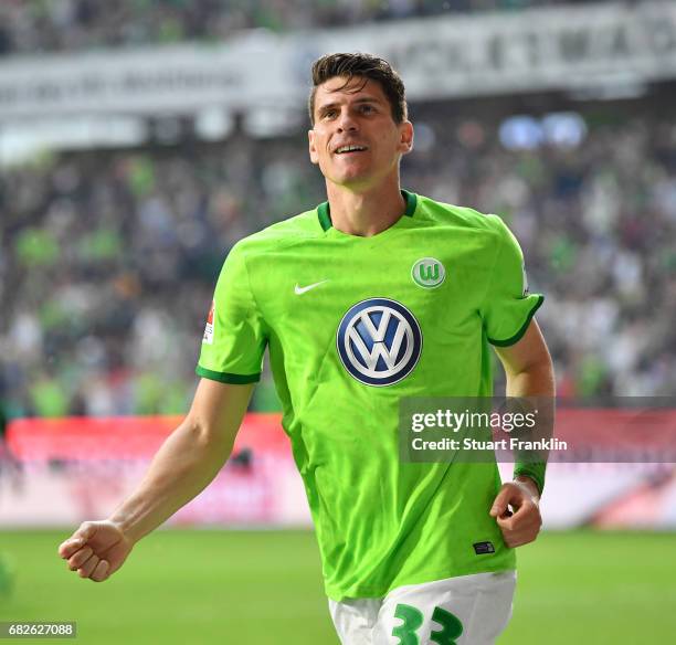 Mario Gomez of Wolfsburg celebrates scoring his goal during the Bundesliga match between VfL Wolfsburg and Borussia Moenchengladbach at Volkswagen...