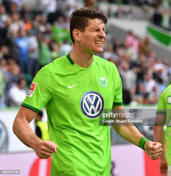 Mario Gomez of Wolfsburg celebrates scoring his goal during the Bundesliga match between VfL Wolfsburg and Borussia Moenchengladbach at Volkswagen...