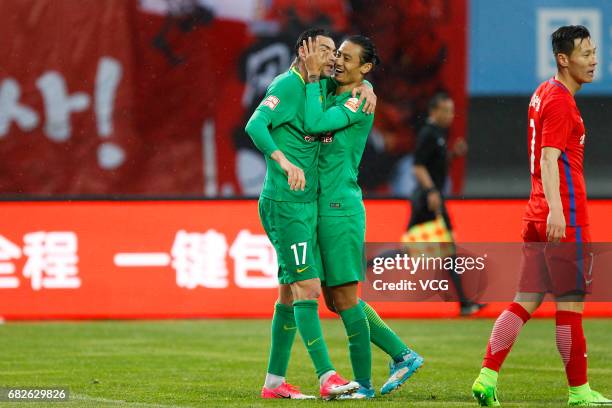 Burak Yilmaz of Beijing Guoan and Song Boxuan of Beijing Guoan celebrate a point during the 9th round match of 2017 Chinese Football Association...