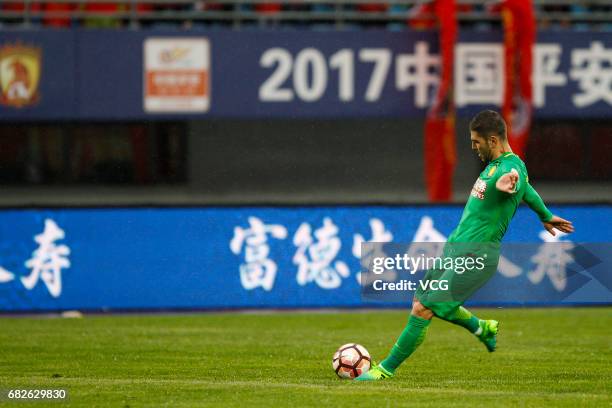 Jonathan Soriano of Beijing Guoan kicks the ball during the 9th round match of 2017 Chinese Football Association Super League between Yanbian Fude...