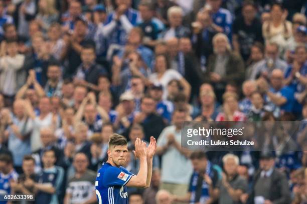 Klaas-Jan Huntelaar of Schalke leaves the pitch because of a replacement during the Bundesliga match between FC Schalke 04 and Hamburger SV at...