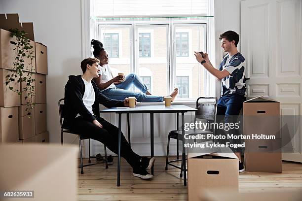 friends hanging out together - three stacked boxes stock pictures, royalty-free photos & images