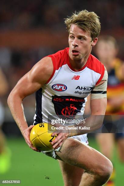 Sam Frost of the Demons looks to pass the ball during the round eight AFL match between the Adelaide Crows and the Melbourne Demons at Adelaide Oval...
