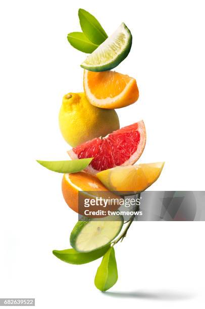 assorted citrus fruits stack still life. - balance cuisine stock pictures, royalty-free photos & images