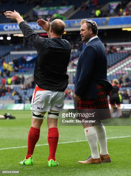 Schalk Burger of Saracens talks with Scott Quinnell prior to the European Rugby Champions Cup Final between ASM Clermont Auvergne and Saracens at...