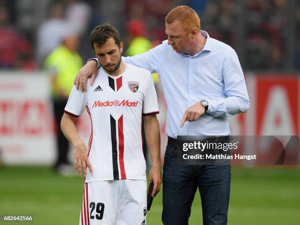 Markus Suttner of Ingolstadt and head coach Maik Walpurgis of Ingolstadt show their disappointment after the Bundesliga match between SC Freiburg and...