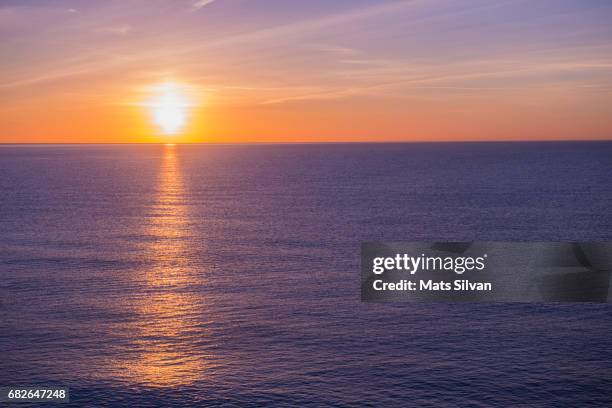 sunset over mediterranean sea - sunset sea stock pictures, royalty-free photos & images