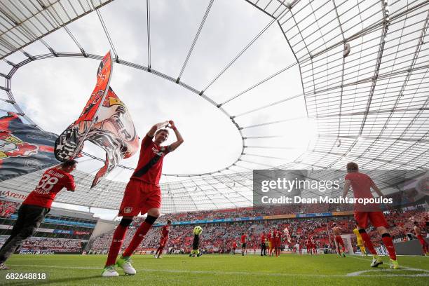 Captain, Stefan Kiessling of Bayer 04 Leverkusen celebrates in front of the home fans after the Bundesliga match between Bayer 04 Leverkusen and 1....