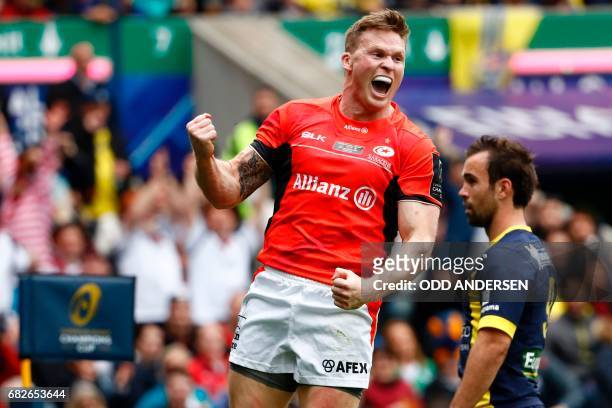 Saracens' English wing Chris Ashton celebrates after scoring the opening try during the rugby union European Champions Cup Final match between...