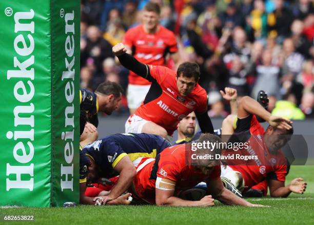 George Kruis of Saracens crashes over to score his team's second try during the European Rugby Champions Cup Final between ASM Clermont Auvergne and...