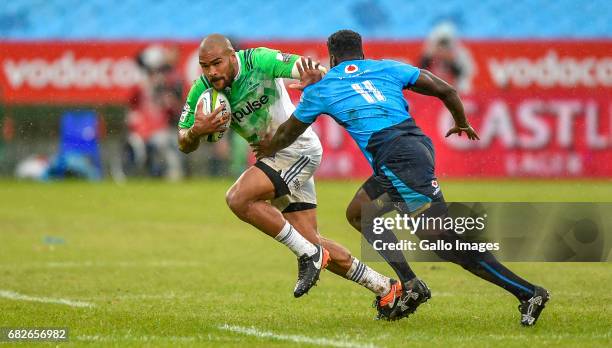 Patrick Osborne of the Highlanders and Jamba Ulengo of the Bulls during the Super Rugby match between Vodacom Bulls and Highlanders at Loftus...