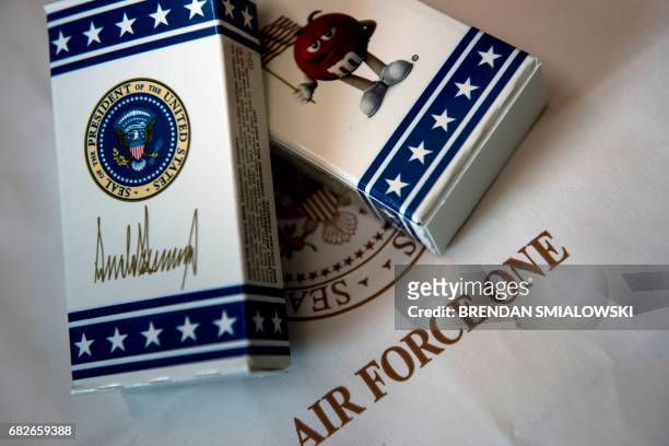 Ms with US President Donald Trump's signature are seen onboard Air Force One May 13, 2017 over Virginia.