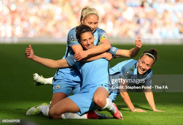 Carli Lloyd of Manchester City celebrates scoring her sides third goal with her Man City team mates during the SSE Women's FA Cup Final between...