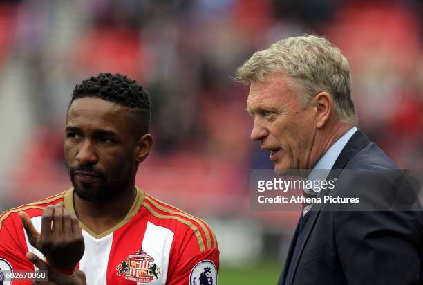 Jermain Defoe of Sunderland is given directions by Sunderland manager David Moyes during the Premier League match between Sunderland and Swansea City...