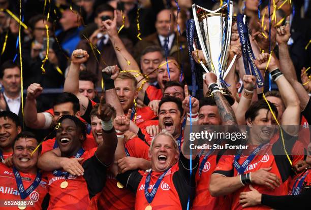 Saracens lift the trophy following their 28-17 victory during the European Rugby Champions Cup Final between ASM Clermont Auvergne and Saracens at...