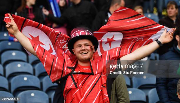 Saracens fan celebrates his team's 28-17 victory during the European Rugby Champions Cup Final between ASM Clermont Auvergne and Saracens at...