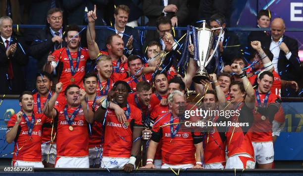 Saracens lift the trophy following their 28-17 victory during the European Rugby Champions Cup Final between ASM Clermont Auvergne and Saracens at...