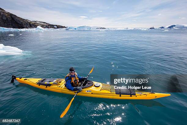 sea kayak master of cruise ship mv sea spirit - antarctica people stock pictures, royalty-free photos & images