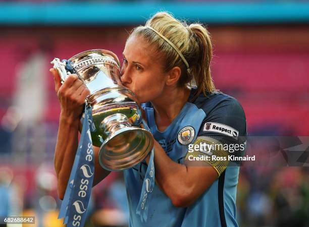 Steph Houghton of Manchester City kisses the trophy after the SSE Women's FA Cup Final between Birmingham City Ladies and Manchester City Women at...