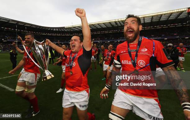 Saracens celebrate with the trophy following their 28-17 victory during the European Rugby Champions Cup Final between ASM Clermont Auvergne and...