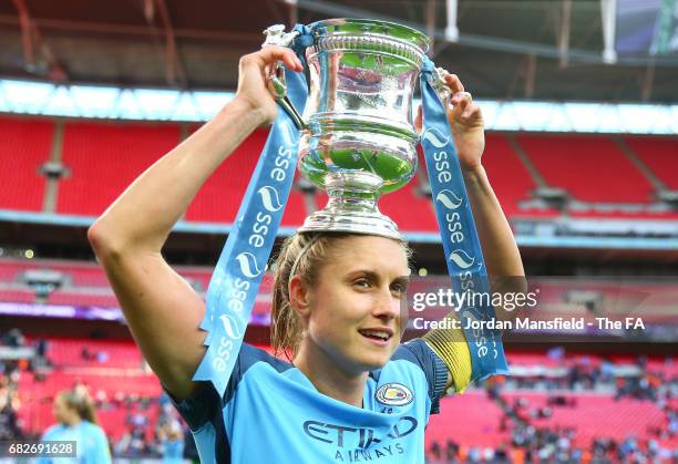 Steph Houghton of Manchester City celebrates with the trophy after the SSE Women's FA Cup Final between Birmingham City Ladies and Manchester City...