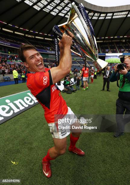 Schalk Brits of Saracens celebrates with the trophy following his team's 28-17 victory during the European Rugby Champions Cup Final between ASM...