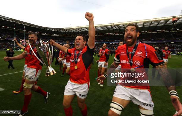 Saracens celebrate with the trophy following their 28-17 victory during the European Rugby Champions Cup Final between ASM Clermont Auvergne and...