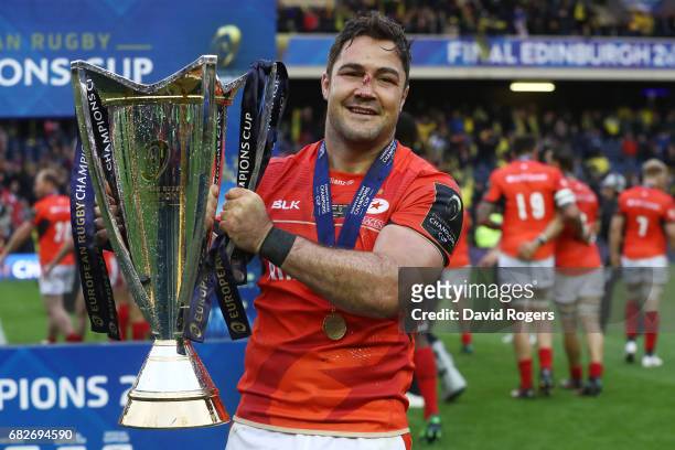 Brad Barritt of Saracens celebrates with the trophy following his team's 28-17 victory during the European Rugby Champions Cup Final between ASM...