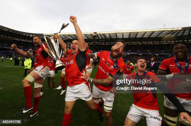 Saracens celebrate with the trophy following their 28-17 victory during the European Rugby Champions Cup Final between ASM Clermont Auvergne and...