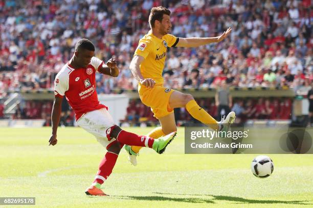 Jhon Cordoba of Mainz scores his team's first goal past David Abraham of Frankfurt during the Bundesliga match between 1. FSV Mainz 05 and Eintracht...