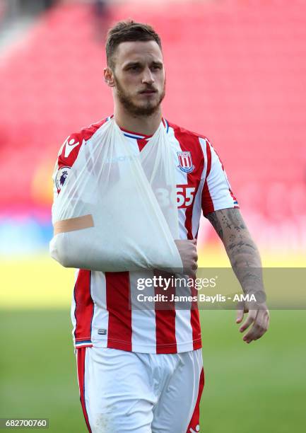 Marko Arnautovic of Stoke City with his arm in a sling after the Premier League match between Stoke City and Arsenal at Bet365 Stadium on May 13,...