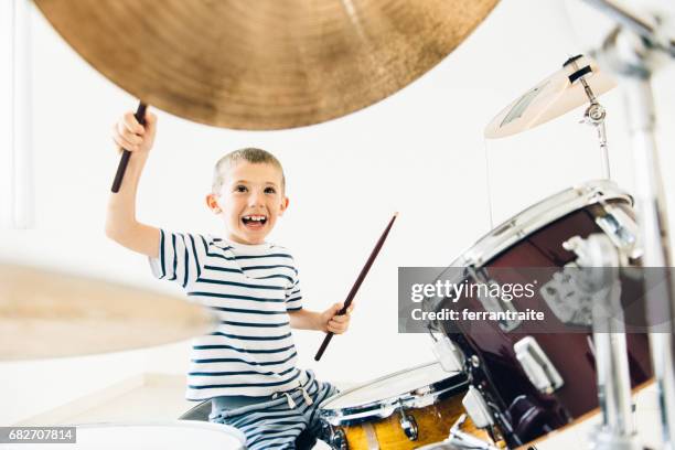 little boy playing drums - hitting drum stock pictures, royalty-free photos & images