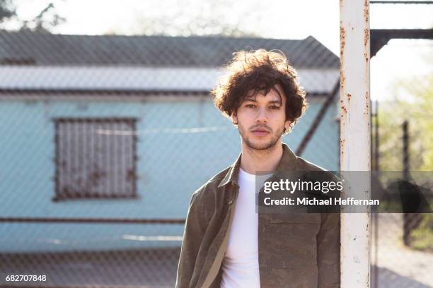 portrait of young man - brown jacket foto e immagini stock