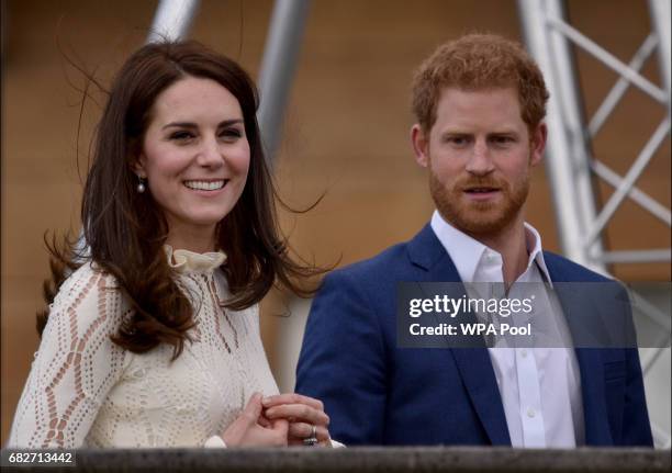 Catherine, Duchess of Cambridge and Prince Harry as they host a tea party in the grounds of Buckingham Palace to honour the children of those who...