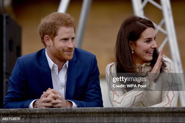 Catherine, Duchess of Cambridge and Prince Harry as they host a tea party in the grounds of Buckingham Palace to honour the children of those who...