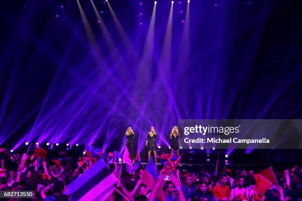 Amy, Shelley and Lisa Vol of the band OG3NE, representing the Netherlands, perform the song 'Lights and Shadows' during the final of the 62nd...