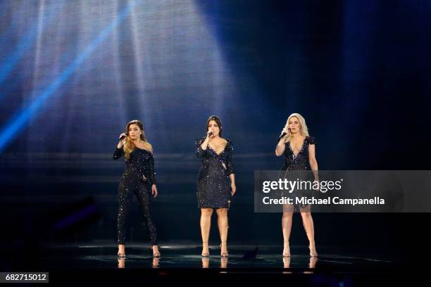 Amy, Shelley and Lisa Vol of the band OG3NE, representing the Netherlands, perform the song 'Lights and Shadows' during the final of the 62nd...