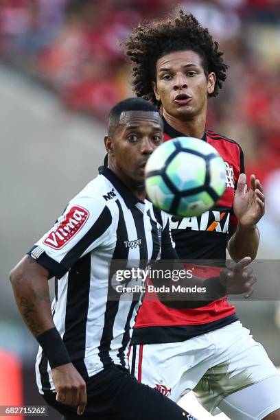 Willian Arao of Flamengo struggles for the ball with Robinho of Atletico MG during a match between Flamengo and Atletico MG part of Brasileirao...