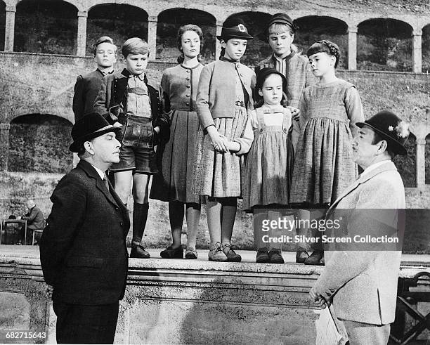 Actor Richard Haydn as Max Detweiler, entering the von Trapp children into the Salzburg Festival in a scene from the musical film 'The Sound of...