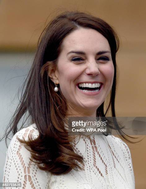 Catherine, Duchess of Cambridge as they host a tea party in the grounds of Buckingham Palace to honour the children of those who have died serving in...