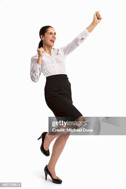 excited happy woman celebrating w fist pump cheer - yes stockfoto's en -beelden