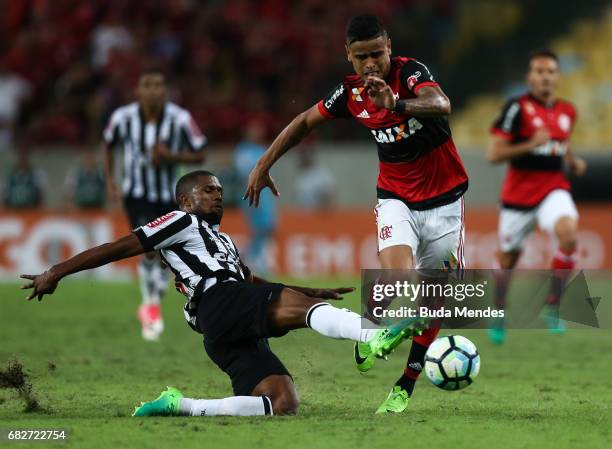 Everton of Flamengo struggles for the ball with Carlos Csar of Atletico MG during a match between Flamengo and Atletico MG part of Brasileirao Series...