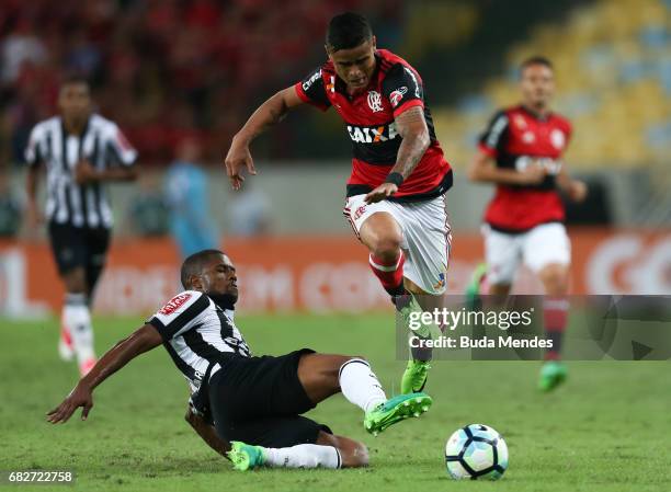 Everton of Flamengo struggles for the ball with Carlos Csar of Atletico MG during a match between Flamengo and Atletico MG part of Brasileirao Series...