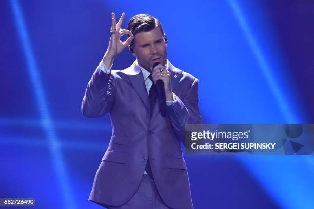 Swedish singer representing Sweden with the song "I can't go on" Robin Bengtsson performs on stage during the final of the 62nd edition of the...