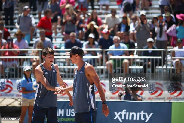 Michael Saeta of UC Irvine and Lucas Yoder of The University of Southern California react to Championship Point during the gold medal match at the...