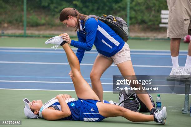 Lynn University's Martina Gledacheva gets stretched out during her singles match with Ana Pain, Pain beat Gledacheva 6-0, 6-4. The Barry University...