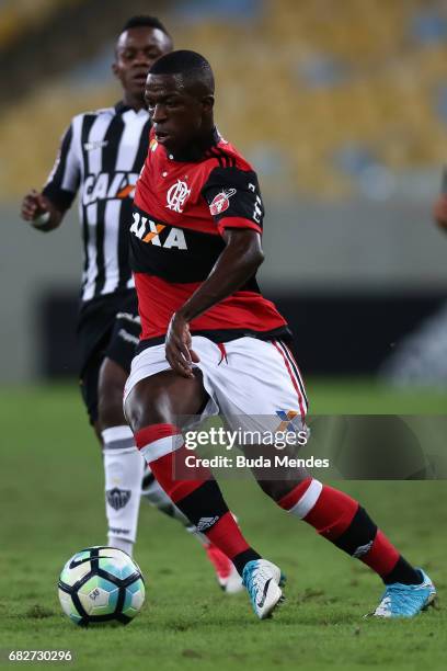 Vinicius Jr. Of Flamengo struggles for the ball with Cazares of Atletico MG during a match between Flamengo and Atletico MG part of Brasileirao...