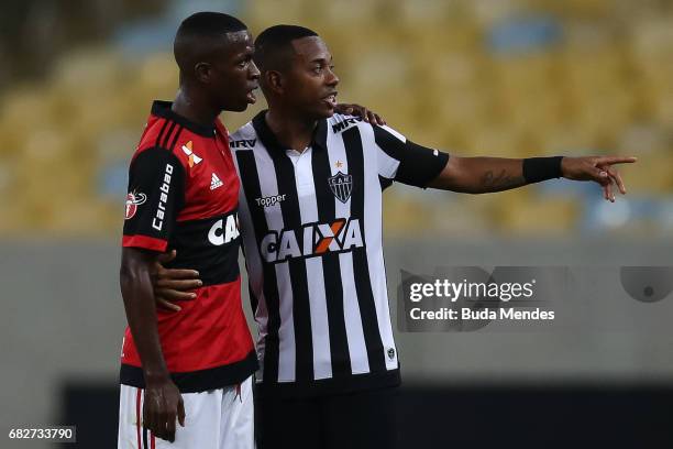 Vinicius Jr of Flamengo greets Robinho of Atletico MG after a match between Flamengo and Atletico MG part of Brasileirao Series A 2017 at Maracana...