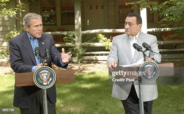 June 8, 2002: President George W. Bush and Egyptian President Hosni Mubarak answer questions on the Middle East during a news conference June 8, 2002...